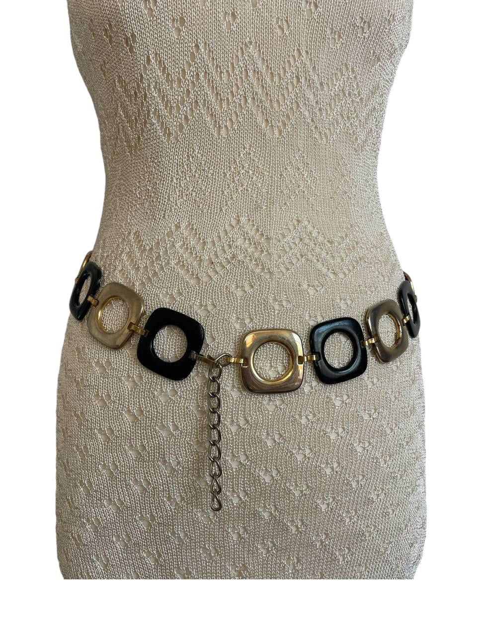 Stylish vintage 2000s metal belt in a trendy black and gold design