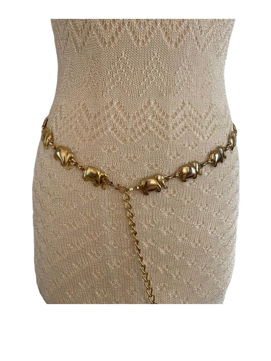 Stylish vintage metal belt with elephants.