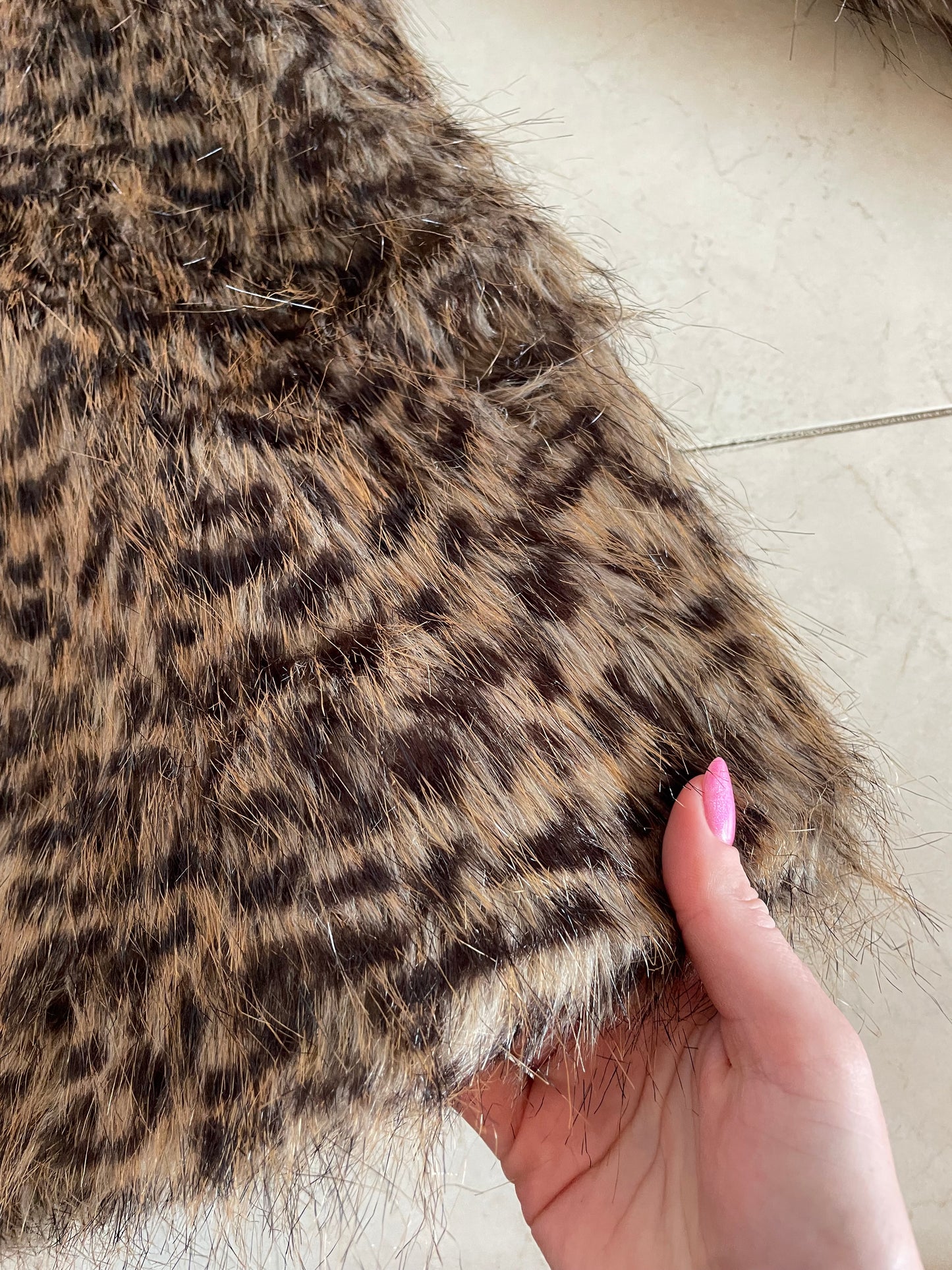 Trendy vintage eco-friendly faux fur coat in an animal print, size M-L.